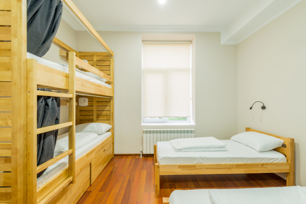 Consider alternative accommodations like Airbnb or hostels - Expert Travel Tips and Tricks for 2023