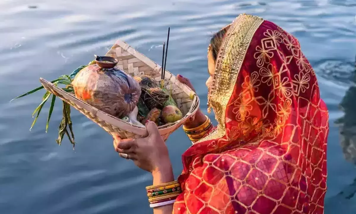 a woman holding a basket of food in the water